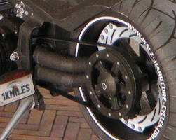 Left side of rear wheel